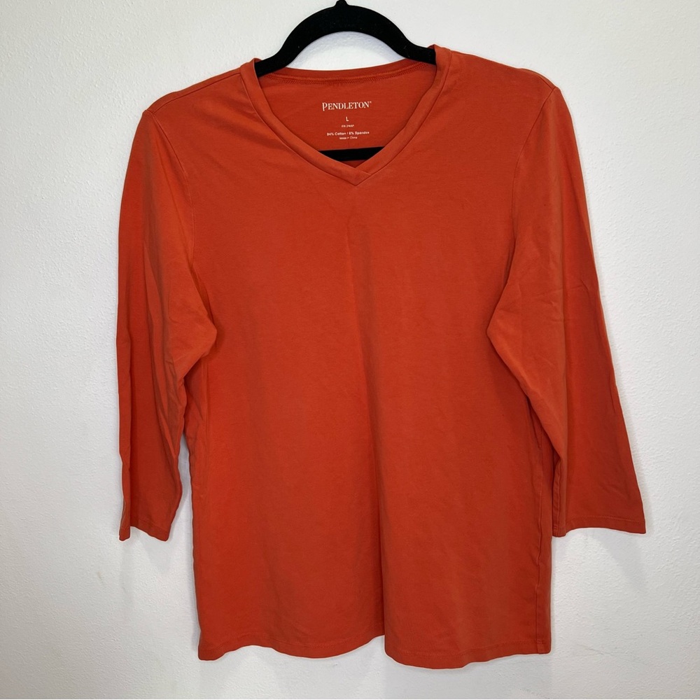 Chic charcoal ribbed knit sweater. Ideal for any season.